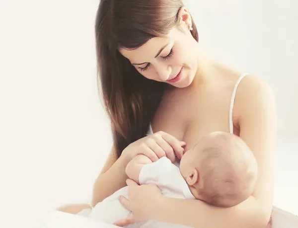 depositphotos_72246199-stock-photo-soft-photo-young-mother-feeding